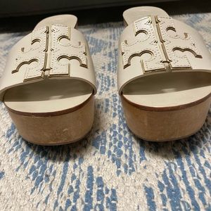 Tory Burch Ines white platform wedges.